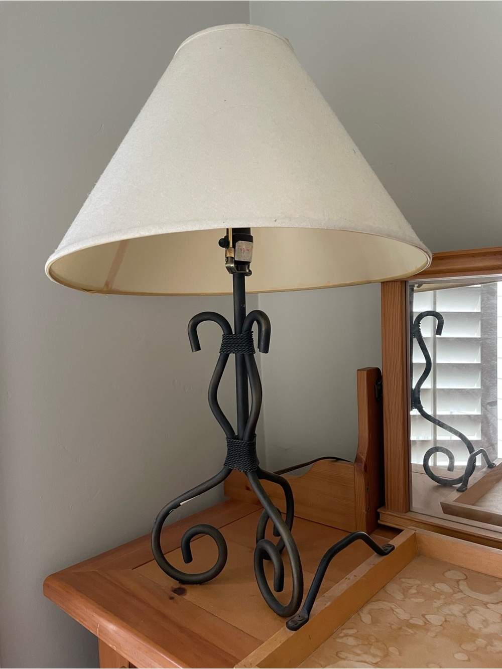 Dark Brown Curved Metal Lamp Arm with cream shade.